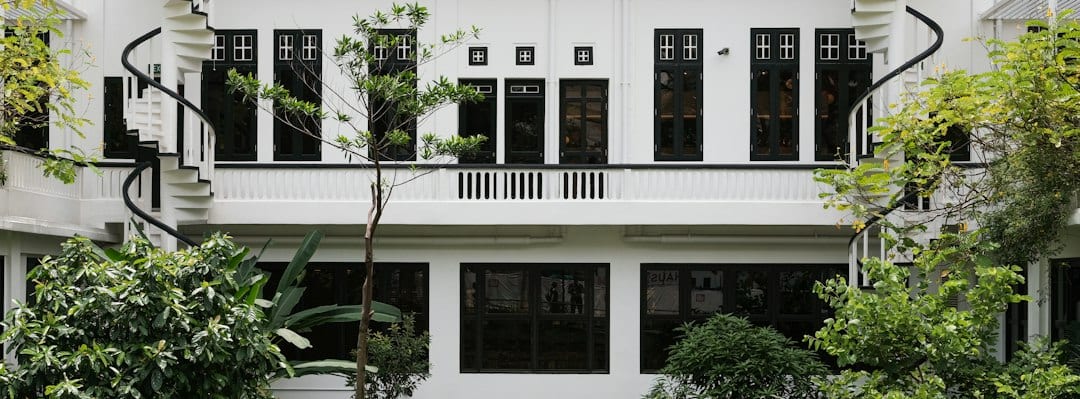 Modern white landed house with clean architectural lines