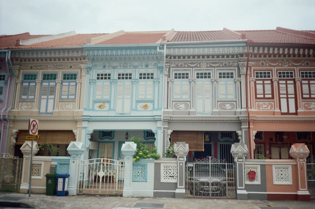 Row of traditional terrace houses with ornate facades